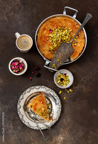 Traditional Arabian Kanafe with Cream and Cheese with pistachio nuts