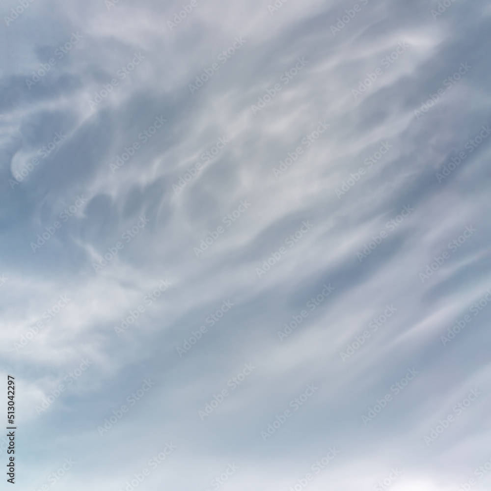 Fantastic clouds against blue sky