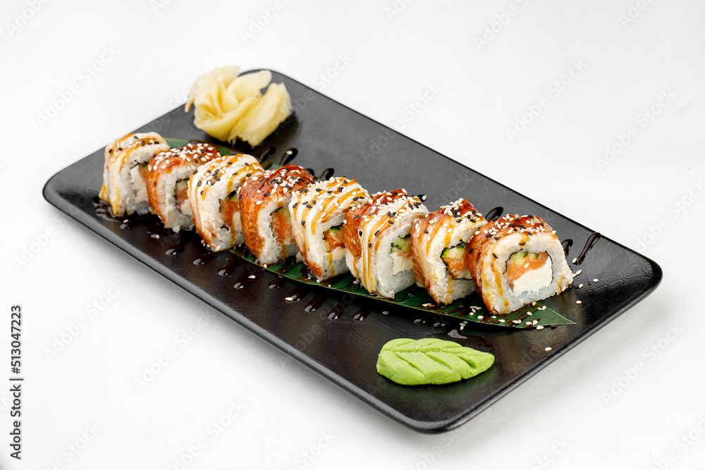 Sushi Canada on black plate and white background Sushi Canada on black plate and white background