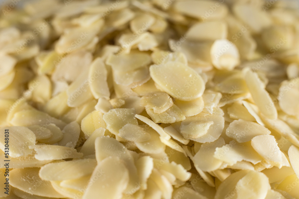 pile of healthy sliced almonds pile of healthy sliced almonds