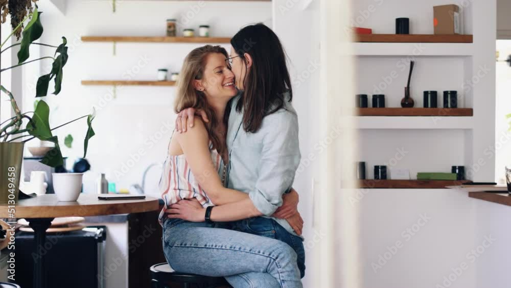 Young lesbian couple embracing and kissing at home
Young lesbian couple embracing and kissing at home