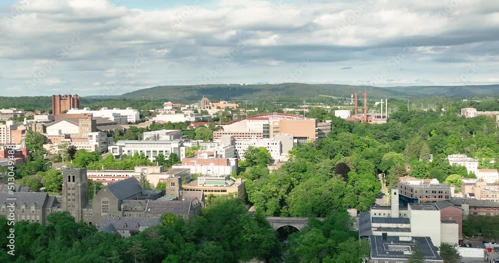 Late afternoon summer scenic aerial video of Ithaca NY, College Town. Late afternoon summer scenic aerial video of Ithaca NY, College Town.