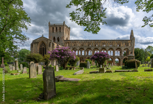 view of the Augustinian Jedburgh Abbey ruins and cemetery in southern Scotland