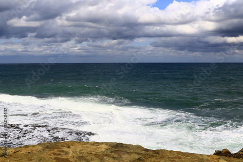 Waves spray. Dramatic seascape and cloudscape views. Black Sea Coastline in autumn season.