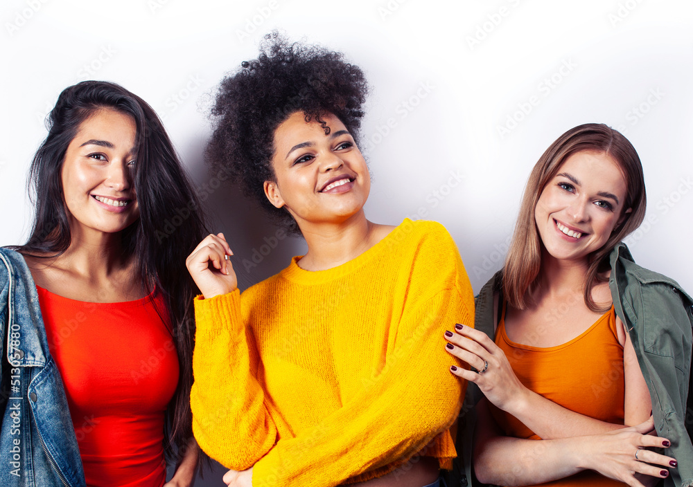 different nation woman: african-american, caucasian, asian together isolated on white background happy smiling, diverse type on skin, lifestyle people concept different nation woman: african-american, caucasian, asian together isolated on white background happy smiling, diverse type on skin, lifestyle people concept