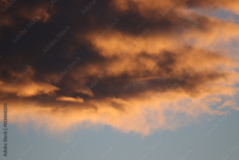 Fototapeta premium awesome dramatic stormy clouds in the sunset sky