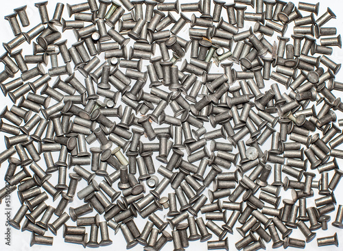Aluminum rivets on white background