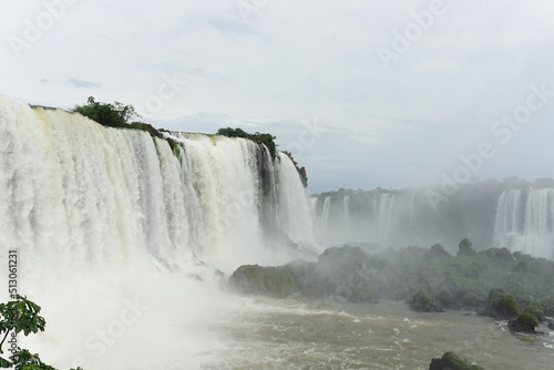 The photo shows a beautiful landscape of Iguazu Falls     a complex of 275 waterfalls on the Iguazu River  located on the border of Brazil  Paran   state  and Argentina  Misiones province .