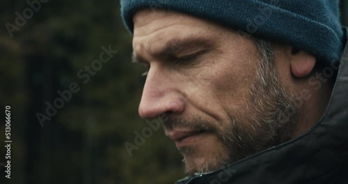 Landscape Photographer taking pictures during a moody autumn day in the hills of Mondsee, Austria
