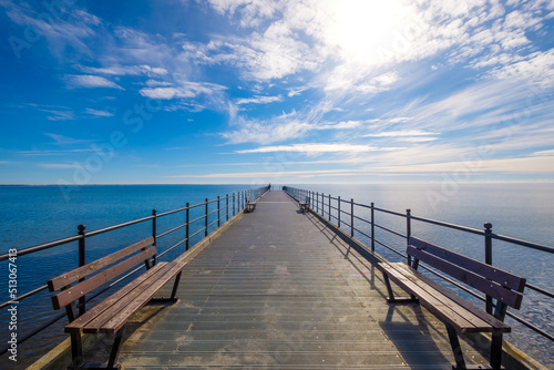 Pier in the sea with a blue sky