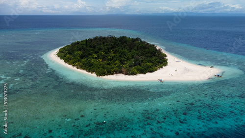 Aerial drone view of a beautiful tropical island, Mantigue Island