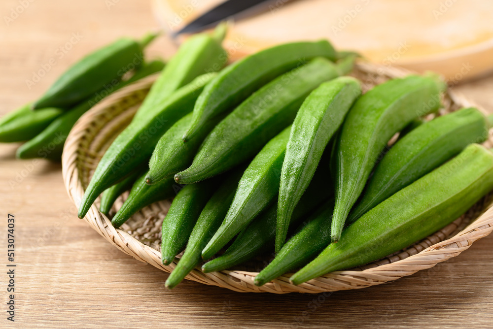 Green okra or ladies fingers (Edible green seed pods), Organic vegetables from local farmer market Green okra or ladies fingers (Edible green seed pods), Organic vegetables from local farmer market