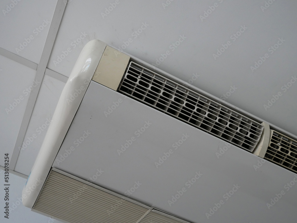 closeup of white air conditioner installation on the wall. closeup of white air conditioner installation on the wall.
