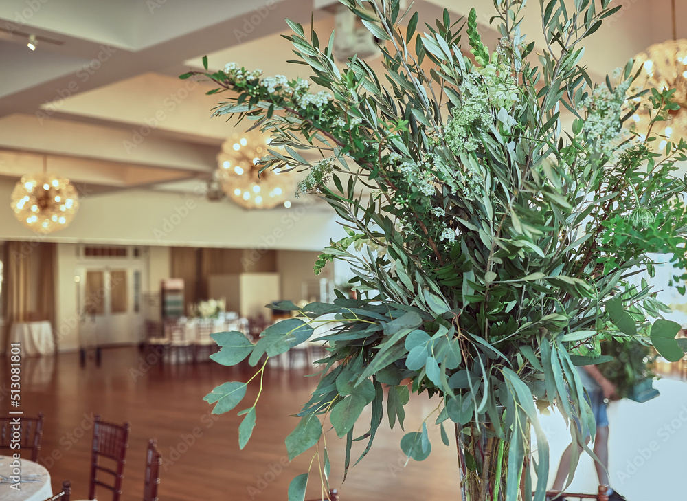 Luxury Beautiful Stylish Romantic Greens and Whites Fresh Flower decorations of guest tables at the wedding venue dinner celebration set up