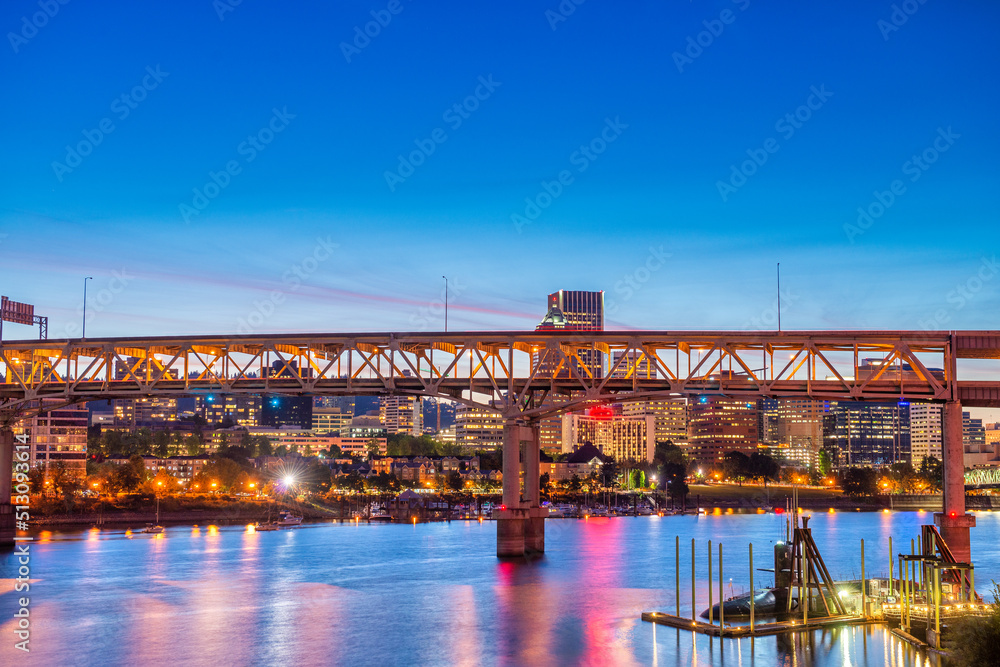 Modern night skyline of Portland with river light reflections, O Modern night skyline of Portland with river light reflections, O