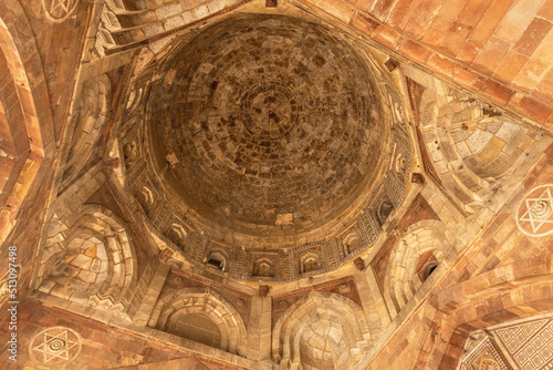 Beautifully decorated interior of dome at Qila Kuhna Masjid Mosque inside of old fortress Purana Quila, Delhi, India