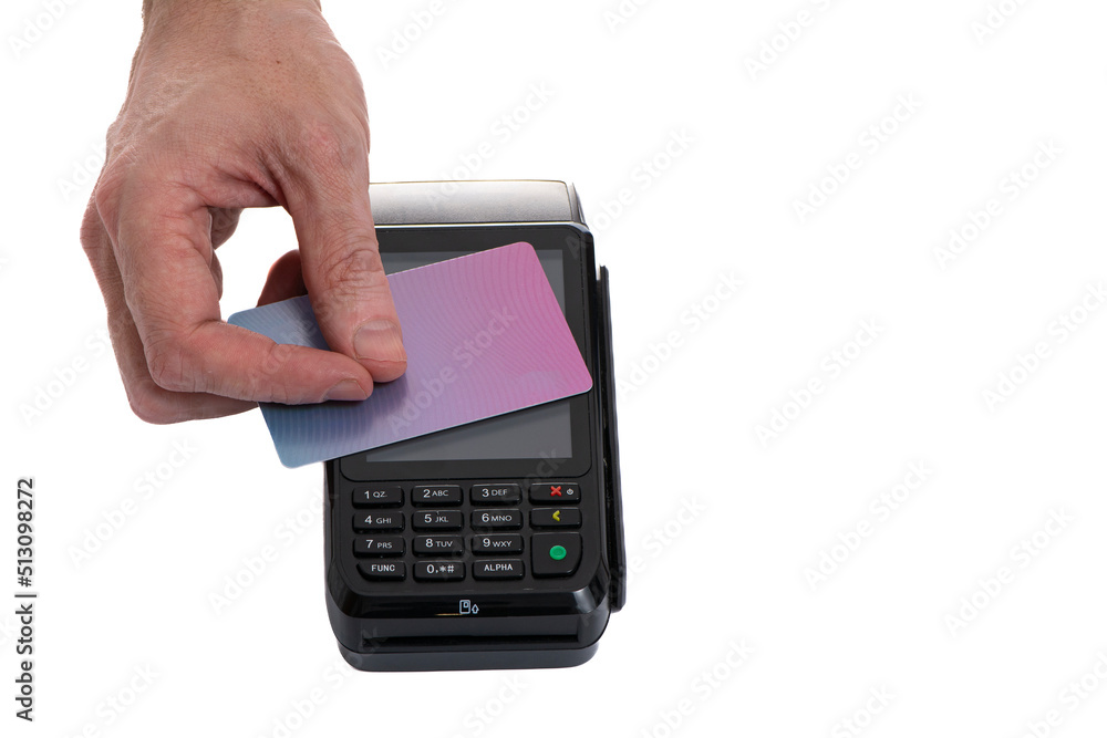 Attached plastic card to the payment terminal with a man's hand on a white isolated background, copy space Attached plastic card to the payment terminal with a man's hand on a white isolated background, copy space