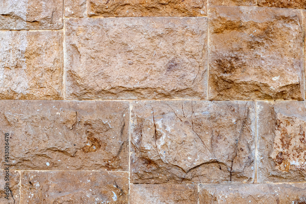 Fototapeta premium Brown stone wall texture background
