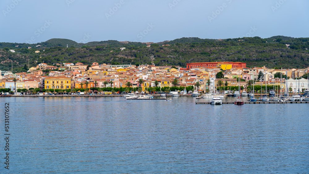 Carloforte. Sardegna. Wonderful cityscape of the town from the boat that is approaching the island. Carloforte is the main city of the San Pietro island