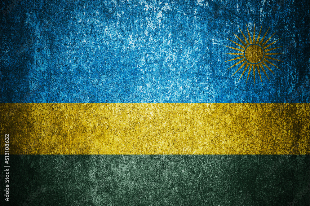 Closeup of grunge Rwandan flag. Dirty Rwanda flag on a metal surface Closeup of grunge Rwandan flag. Dirty Rwanda flag on a metal surface