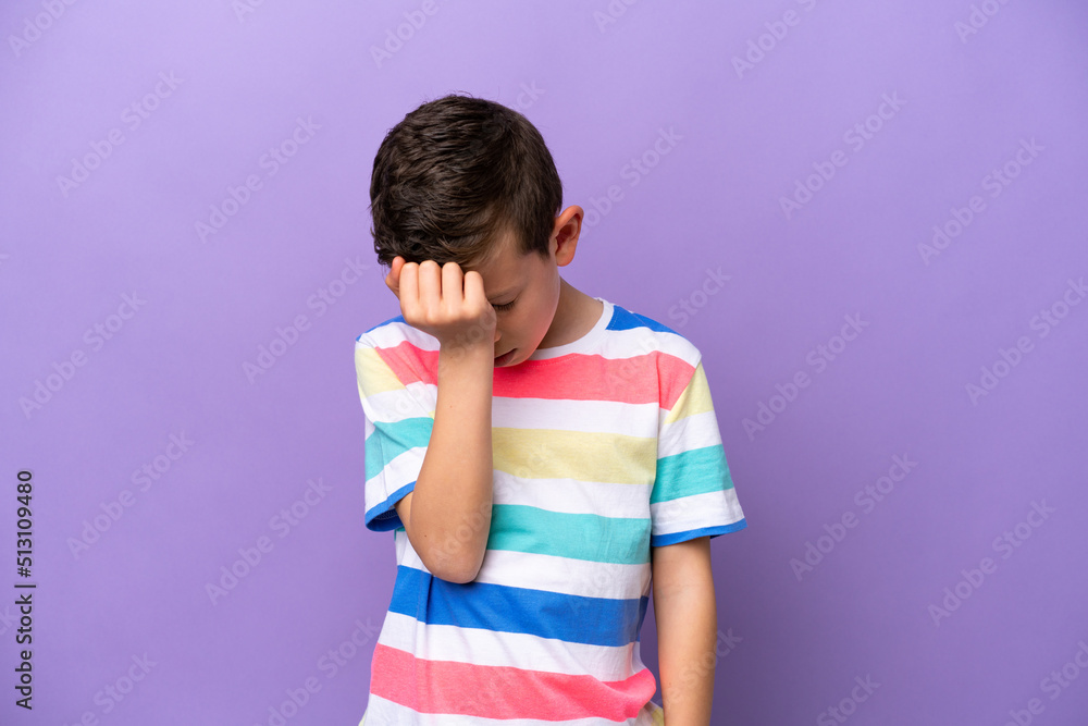 Little boy isolated on purple background with headache Little boy isolated on purple background with headache