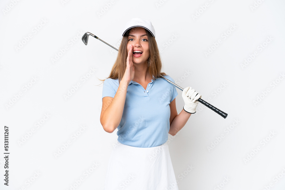 Young caucasian woman isolated on white background playing golf and shouting with mouth wide open Young caucasian woman isolated on white background playing golf and shouting with mouth wide open