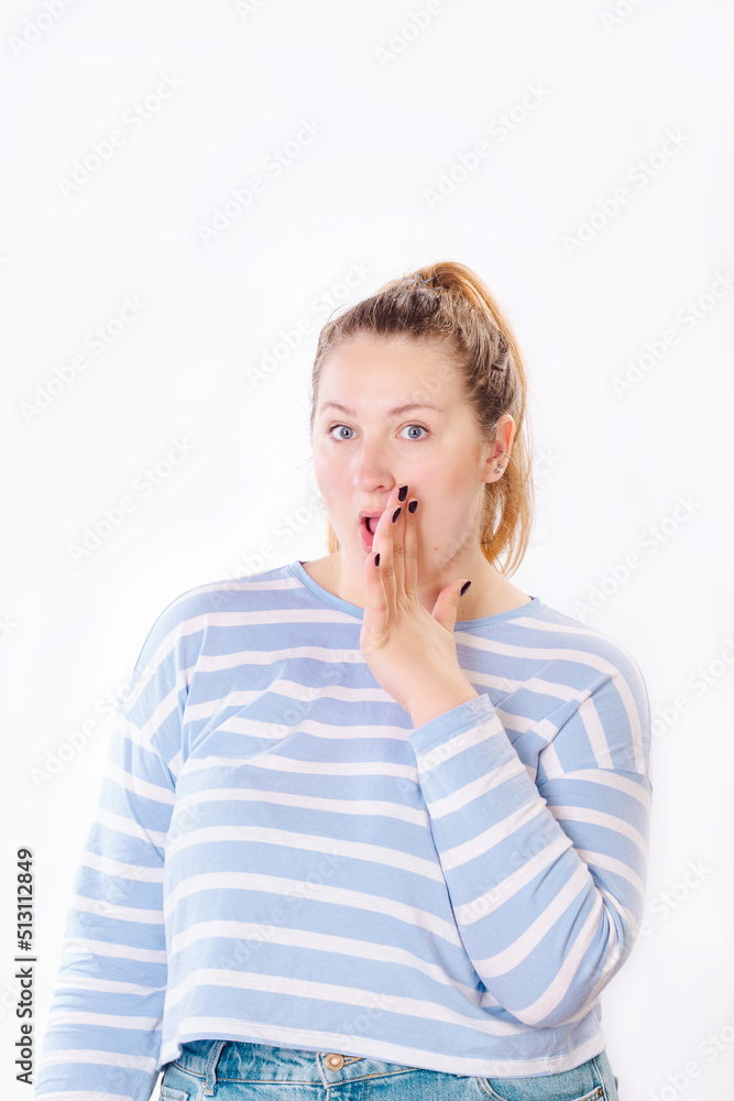 Portrait of beautiful wondered young woman with surprised face standing at isolated white background Portrait of beautiful wondered young woman with surprised face standing at isolated white background