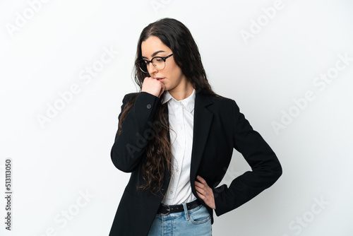 Young business woman isolated on white background having doubts