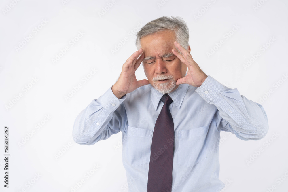 Asian senior businessman , old man headache hands on forehead , stressed from work on white background with copy space - medical and healthcare concept Asian senior businessman , old man headache hands on forehead , stressed from work on white background with copy space - medical and healthcare concept