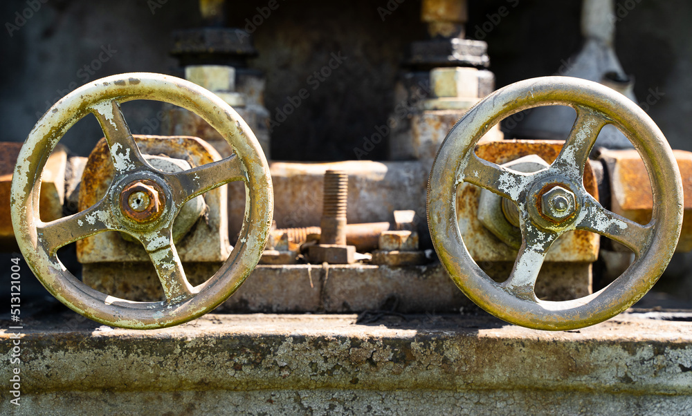 aged grunge rusted industrial valve wheels