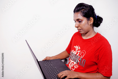 young woman working using computer laptop concentrated and confident