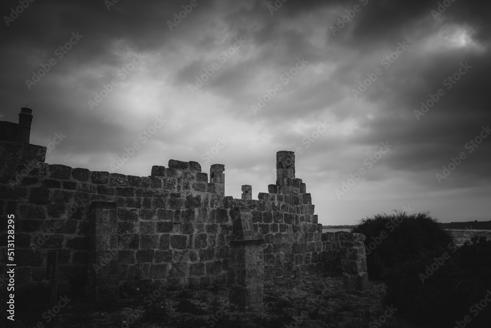 East Coast of Sicily in Italy, Europe on a warm spring day at the coast with old structures