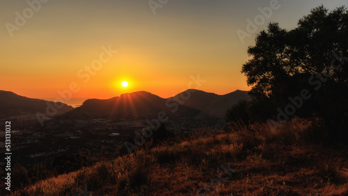 Evening in the coastal hills of Sicily on Monte Pellegrino near Palermo in Summer on a warm evening sunset © andiz275