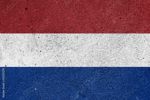 Netherlands flag on a plastered wall