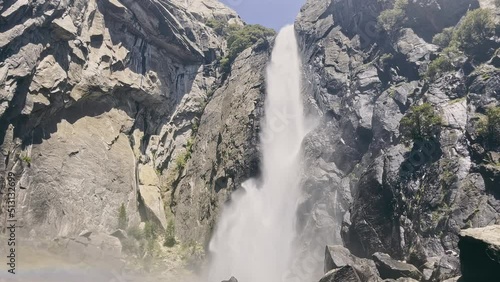 Yosemite Big waterfall close up. Yosemite national Park, California, USA. Waterfall on the rocks of stone. photo