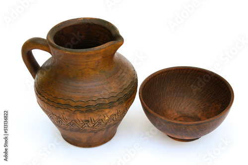Set of kitchen utensils jug and earthenware plate