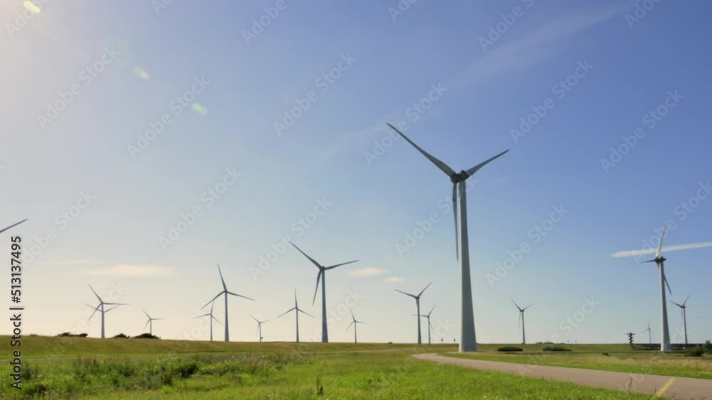 Wind power turbines generating clean renewable energy. Slow motion Wind power turbines generating clean renewable energy. Slow motion