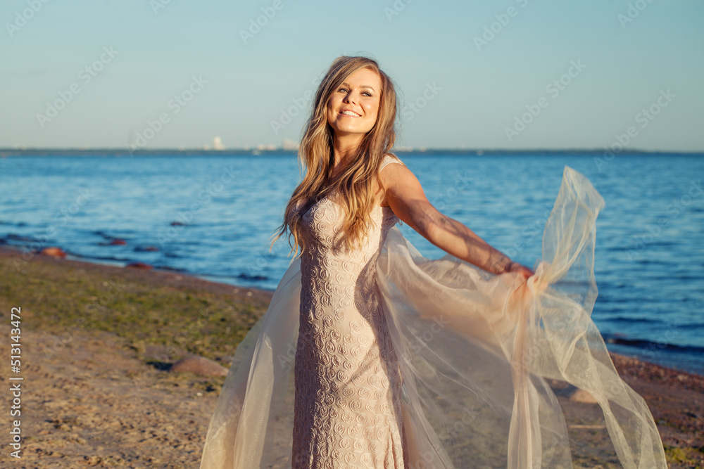 Beautiful happy woman enjoying sun and nature outdoors Beautiful happy woman enjoying sun and nature outdoors