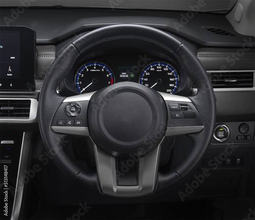 Inside the luxury car steering wheel, gear lever and dashboard. © Nitinan