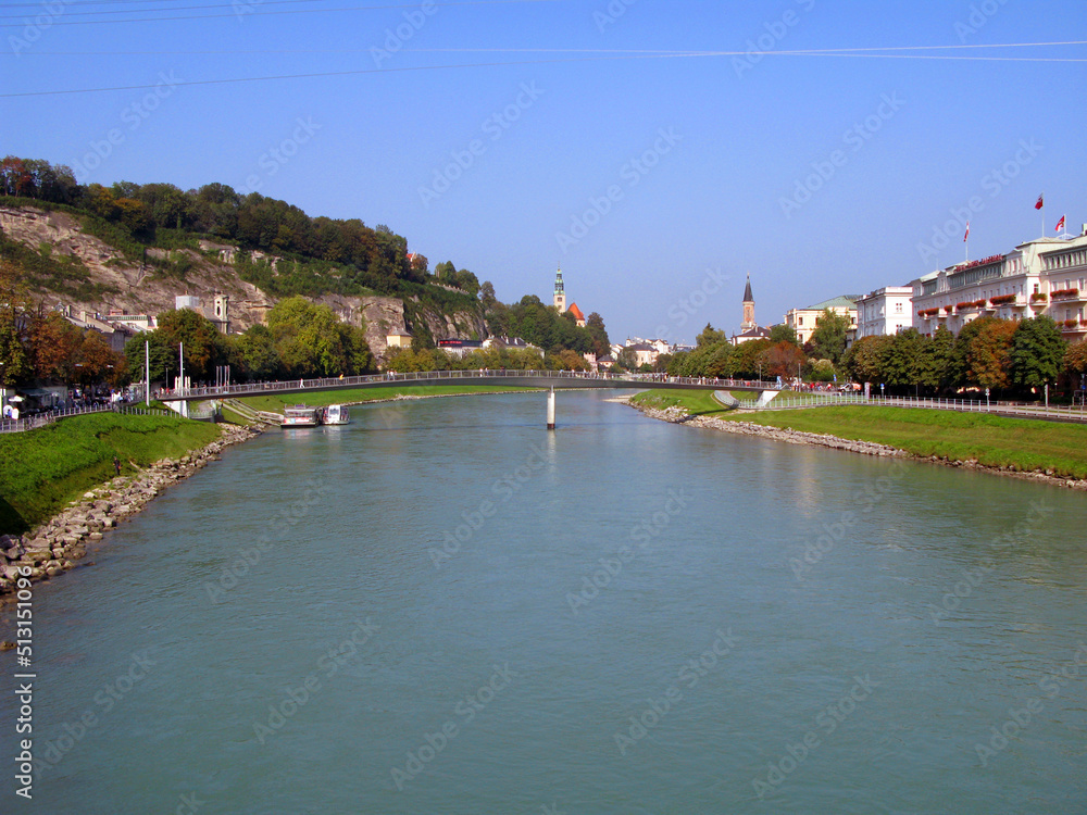 Salzburg, embankment of the Salzach river, view of the city from afar. Austria