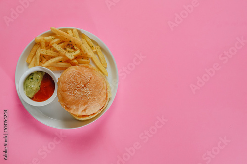 Burger and potatoes and gravy photo