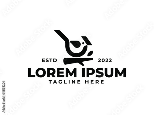 logo bird perched on a branch premium vector. Black bird logo