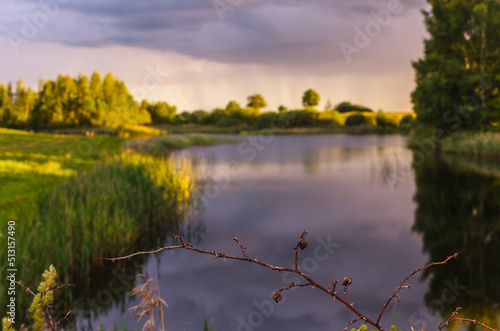 evening sunset on the lake in the village 3