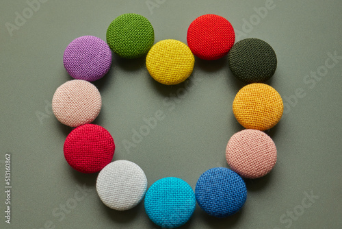 multicolored cotton buttons close up © Mykhailo