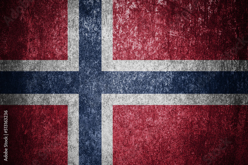Closeup of grunge Norwegian flag. Dirty Norway flag on a metal surface