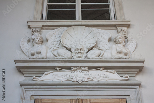 Sculptural details of Royal palace (Palace on the Water) in Lazienki park at winter in Warsaw, Poland