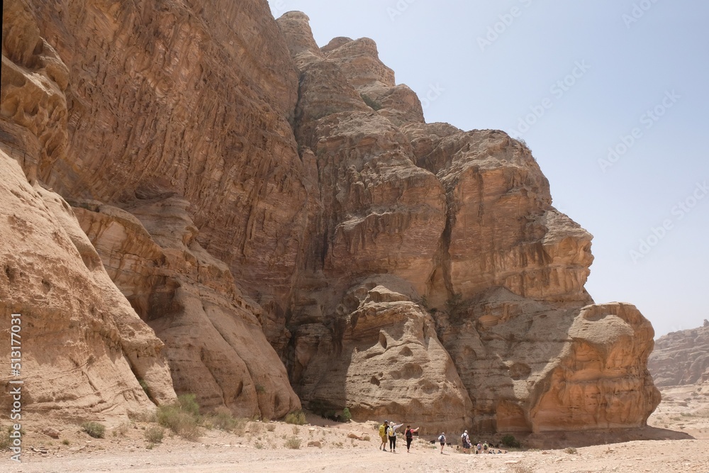 Wonderful mountain views with silhouettes of hiking people on the Jordan Trail from Little Petra (Siq al-Barid) to Petra. Jordan, Hashemite Kingdom of Jordan 