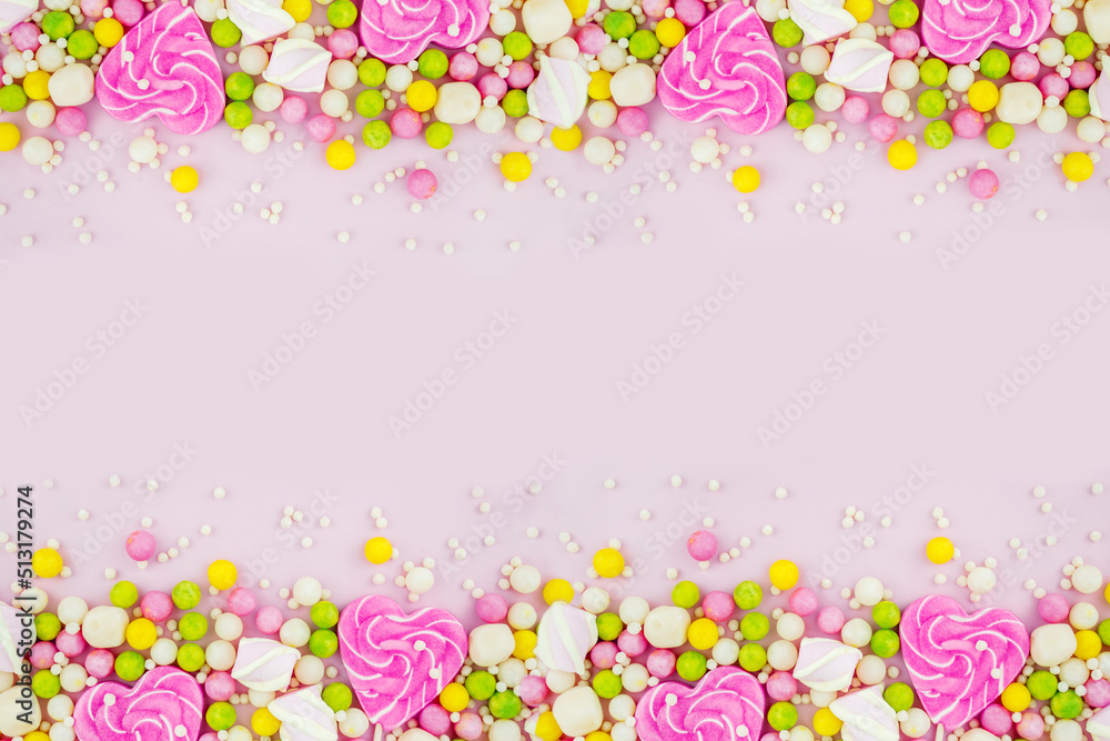 Caramel in the shape of a pink heart. happy Valentine's day. bright candies and marmalade Caramel in the shape of a pink heart. happy Valentine's day. bright candies and marmalade