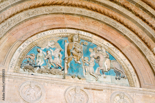 Verona  Italy - lunette decorated with polychrome reliefs depicting the Madonna enthroned with Child  entrance portal of the cathedral of Santa Maria Assunta