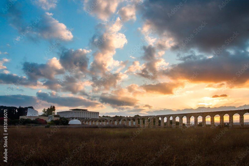 A Roman aqueduct at sunrise in Kibbutz Lohamei Haghetaot